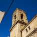 Sulla chiesa si erge per, semplice ed elegante, un alto campanile che guarda il mare, costruito a pi riprese fra il 1664 e il 1732 e contraddistinto su ogni lato da monofore affiancate da lunghe lesene